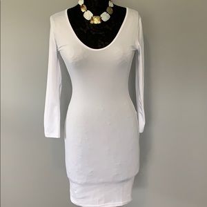 White bodycon dress.  Size small. Never worn.